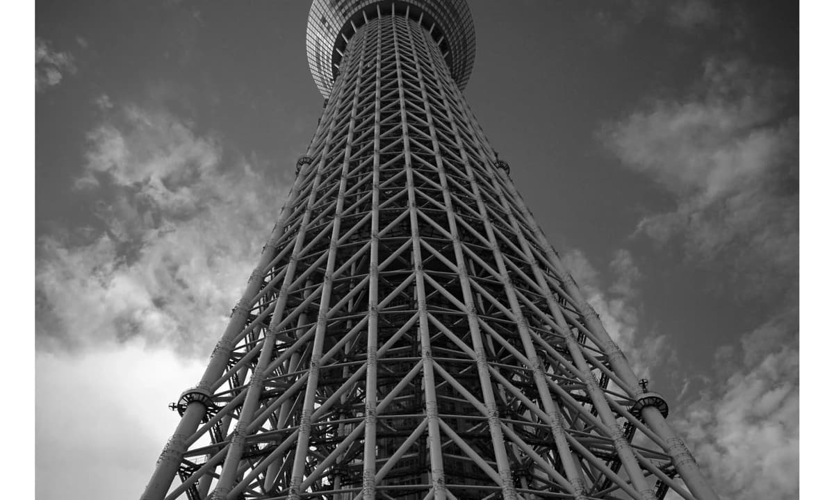 Tokyo Skytree viewed from its ground-level base looking upward on a sunny day, Sumida ward