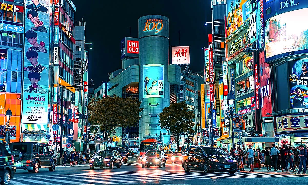 ufotable Cafe Tokyo storefront with Demon Slayer Kizuna collaboration signage for the 2026 rerun event