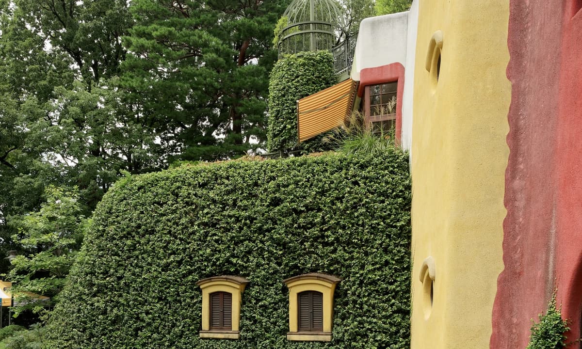 Ghibli Museum exterior in Mitaka, Tokyo — the small forest-museum designed by Hayao Miyazaki on the south edge of Inokashira Park