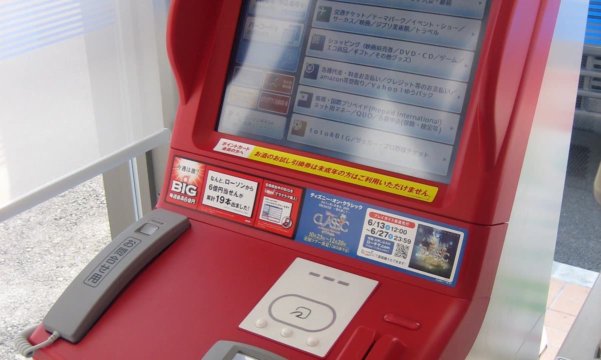Lawson Loppi kiosk in Japan — the red touchscreen terminal used to book most anime collab cafes