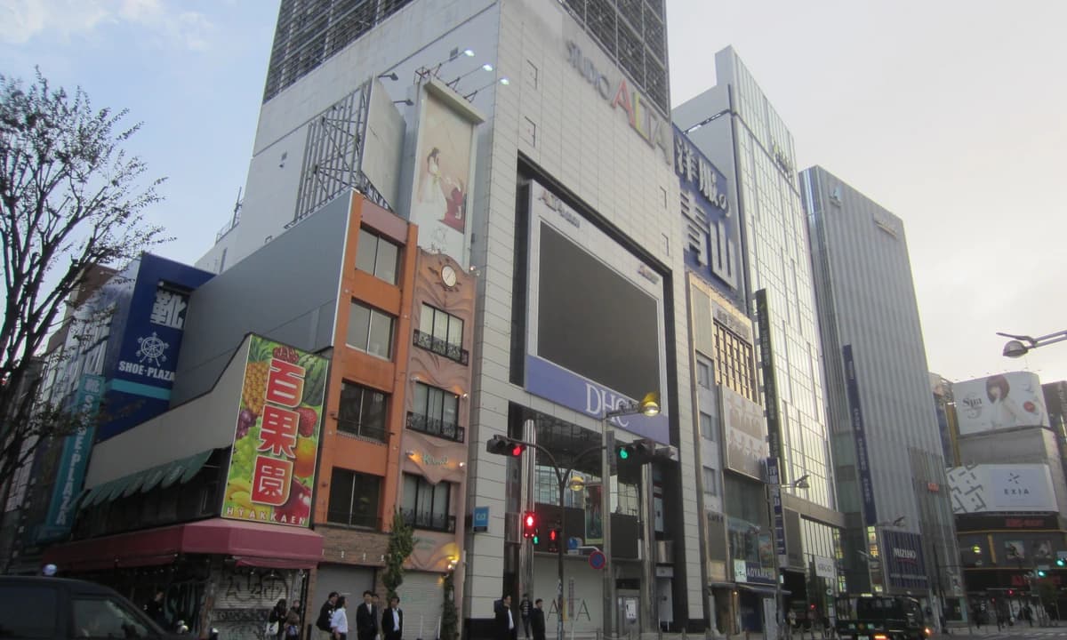 Studio Alta and Aoyama-Mizuho buildings at Shinjuku East Exit — the Tokyo district where Sweets Paradise Shinjuku East hosts the Hypnosismic Round 8 collab from May 1 to May 31, 2026
