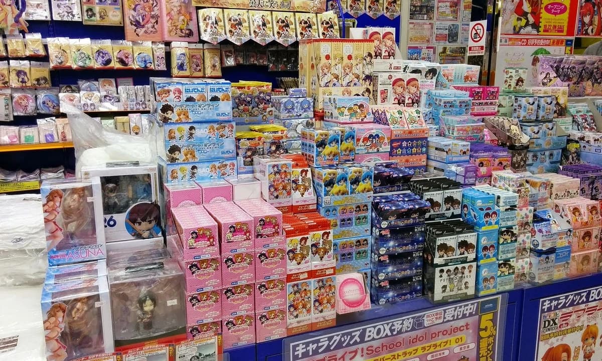 Anime figure and Nendoroid display at an Akihabara shop — the kind of merchandise typically purchased through proxy services like Buyee, ZenMarket, and FROM JAPAN