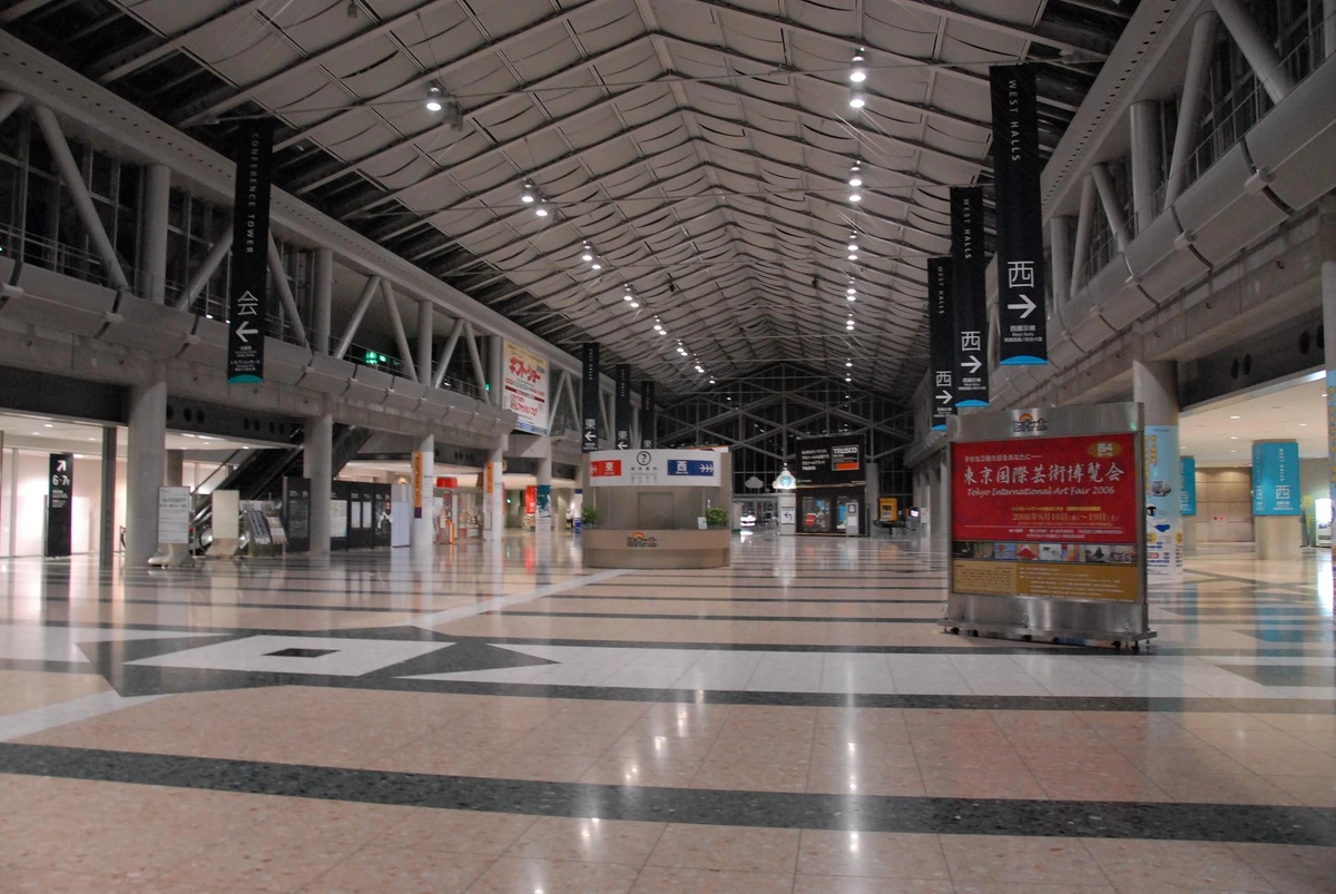 Tokyo Big Sight entrance hall interior where anime event ticketing and registration takes place