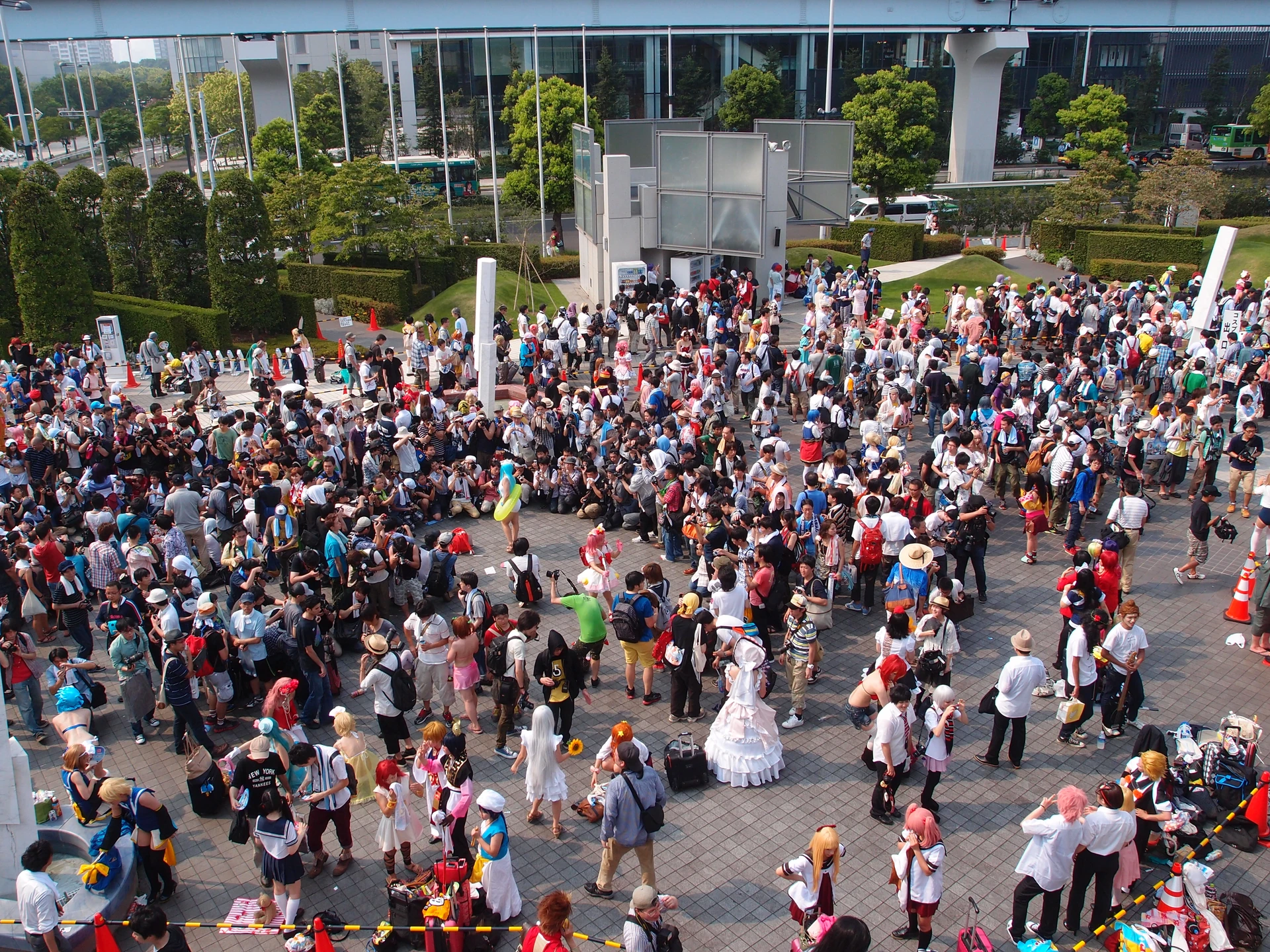 Cosplayers gathered at the Comiket cosplay area outside Tokyo Big Sight exhibition halls