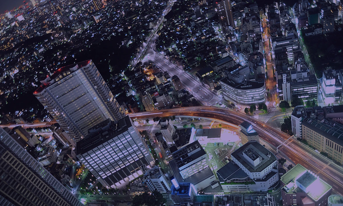 Ikebukuro skyline at night with a dark purple moon-lit tone