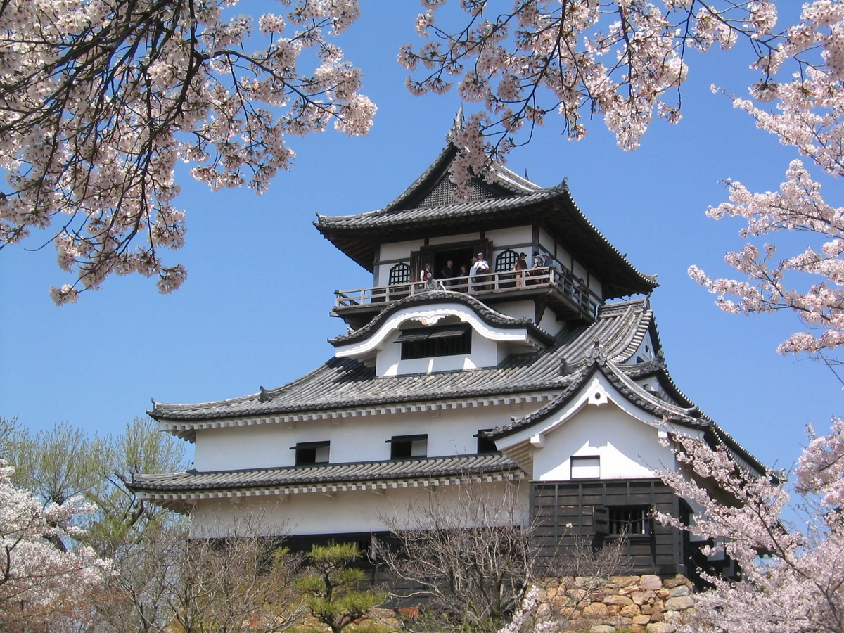 Inuyama Castle keep on its hilltop above the Kiso River, fifteen minutes from Museum Meiji-mura