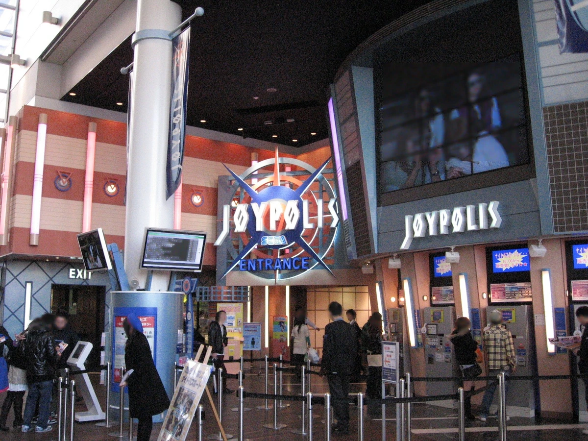 Tokyo Joypolis indoor theme park interior with multi-storey atrium and amusement attractions
