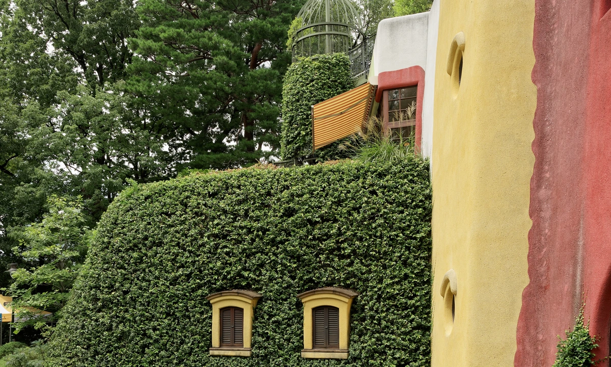 Ghibli Museum exterior in Mitaka, Tokyo — the small forest-museum designed by Hayao Miyazaki on the south edge of Inokashira Park