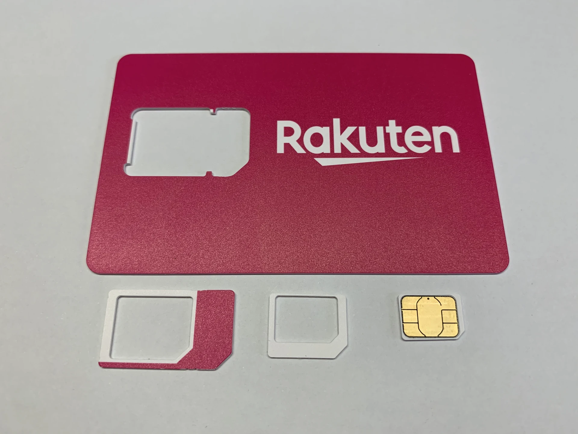 Rakuten Mobile multi-cut SIM card with mini SIM, micro SIM, and nano SIM punch-outs, the same flexible SIM format Japan carriers issue to international travelers