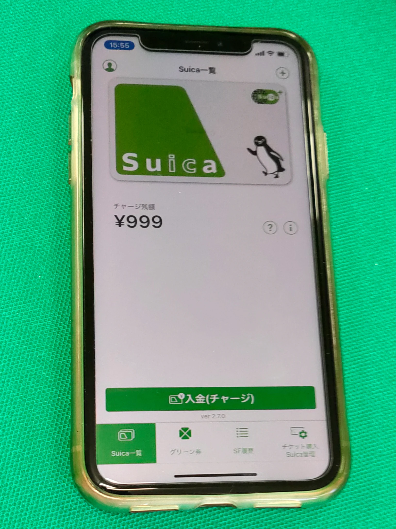 Real iPhone showing the Mobile Suica balance screen with the JR East penguin mascot, the digital tourist card visitors install in the Apple Wallet