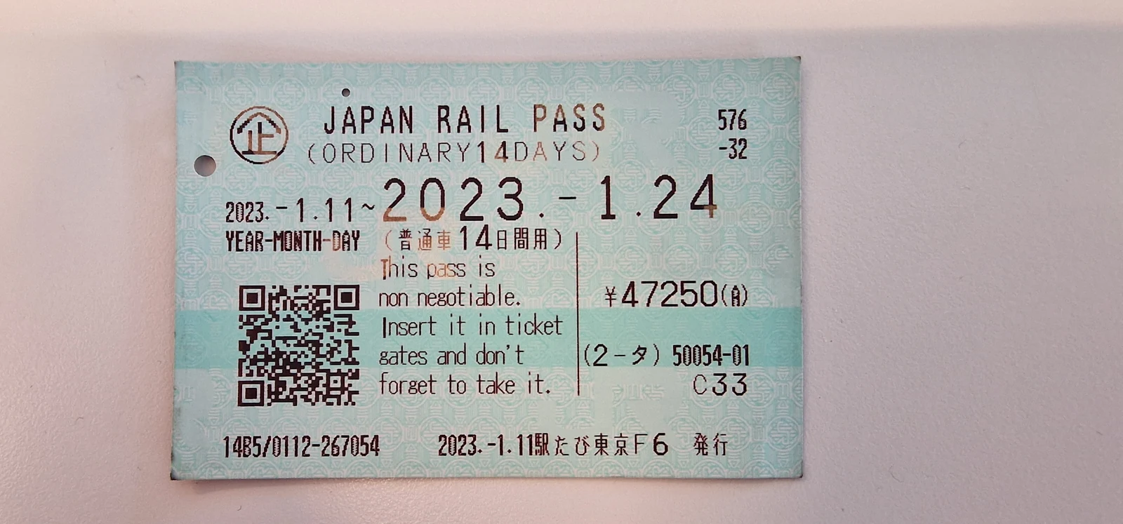 A physical Japan Rail Pass card showing the layout and printed validity dates anime fans receive after airport exchange