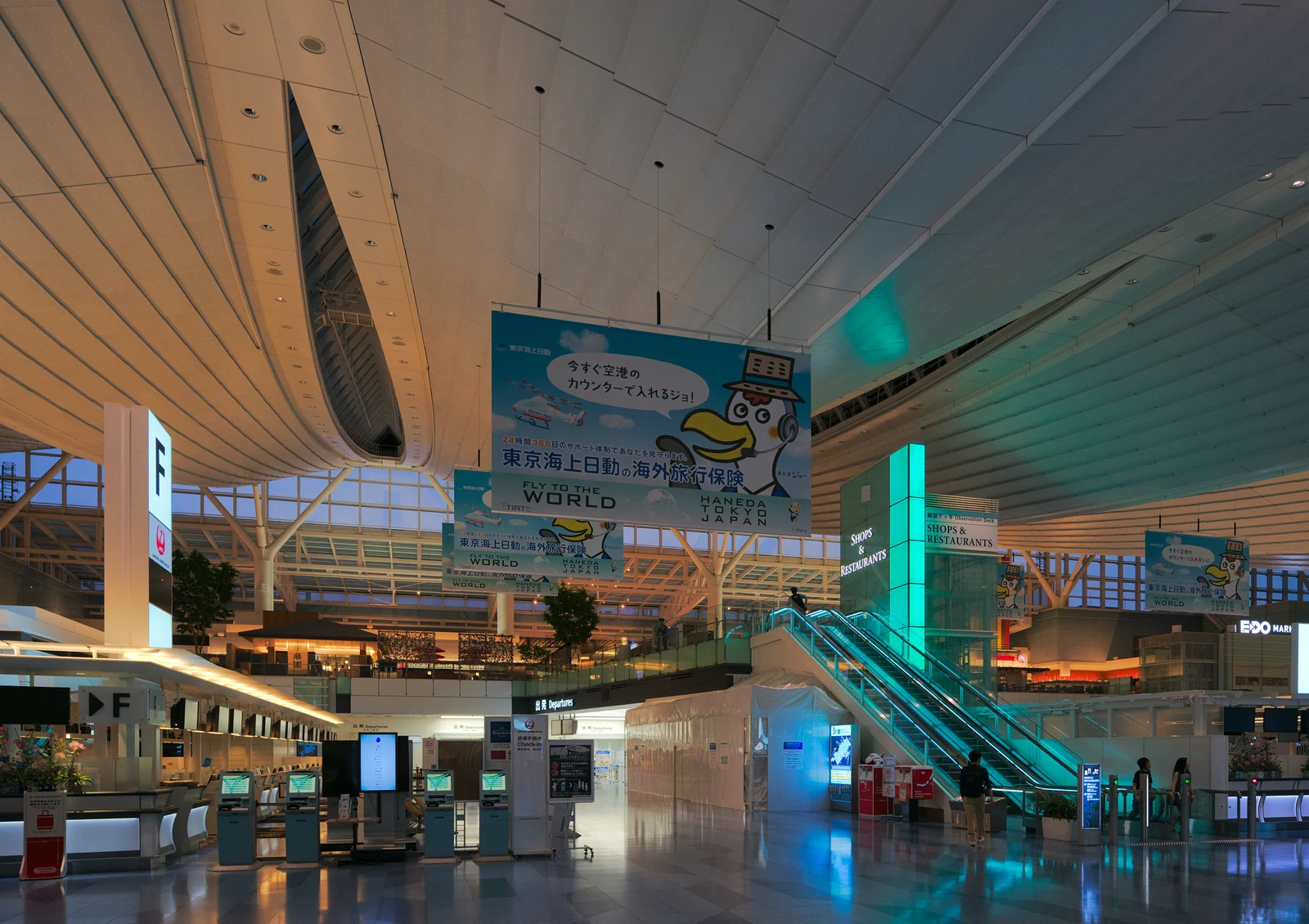 Haneda Airport International Terminal departure lobby with check-in counters and overhead signage typical of an anime fan's first arrival in Tokyo