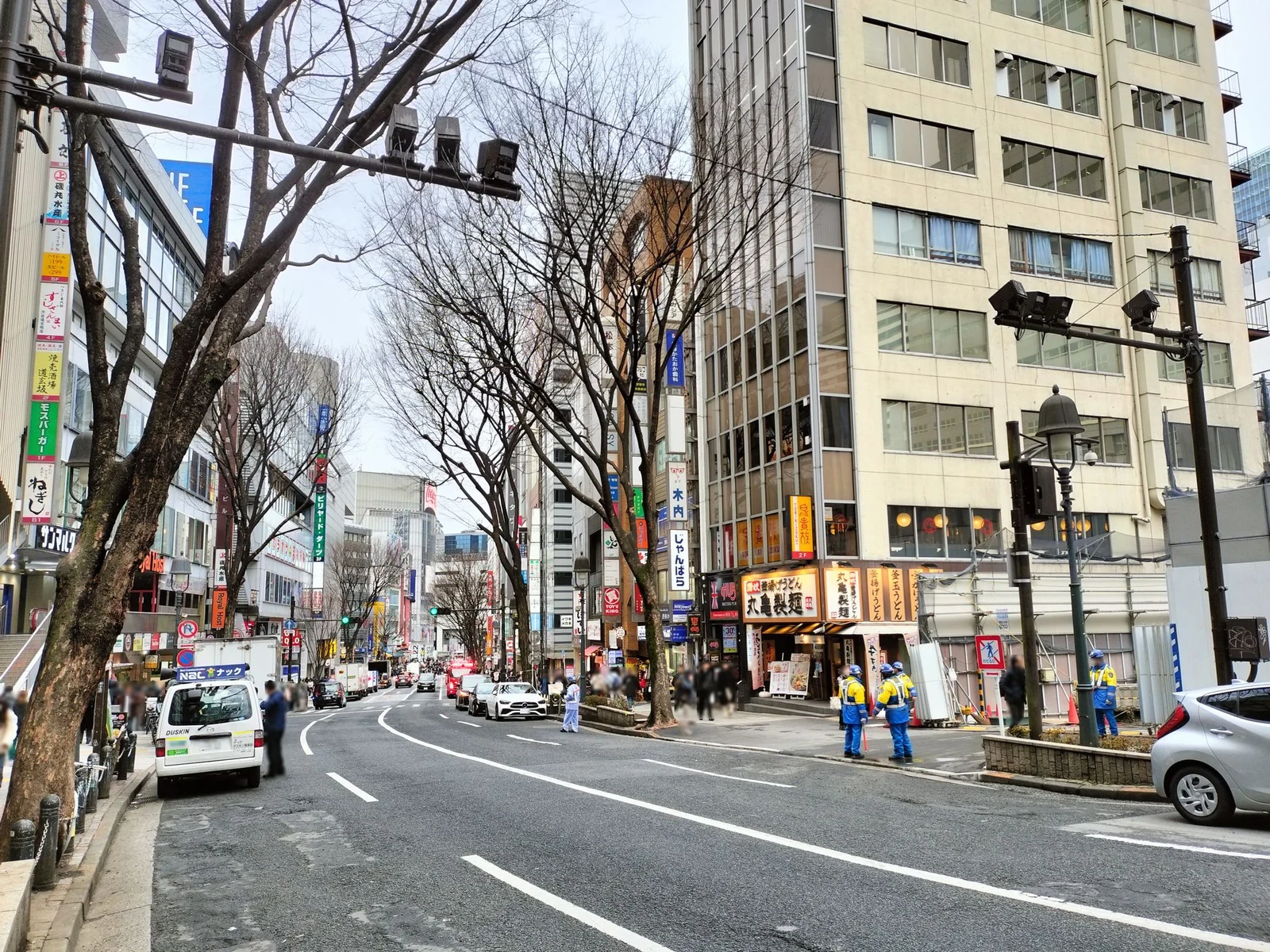 Dogenzaka street in Shibuya, the main commercial slope running from Hachiko Square toward 109, used as a chase route in JJK's Shibuya Incident
