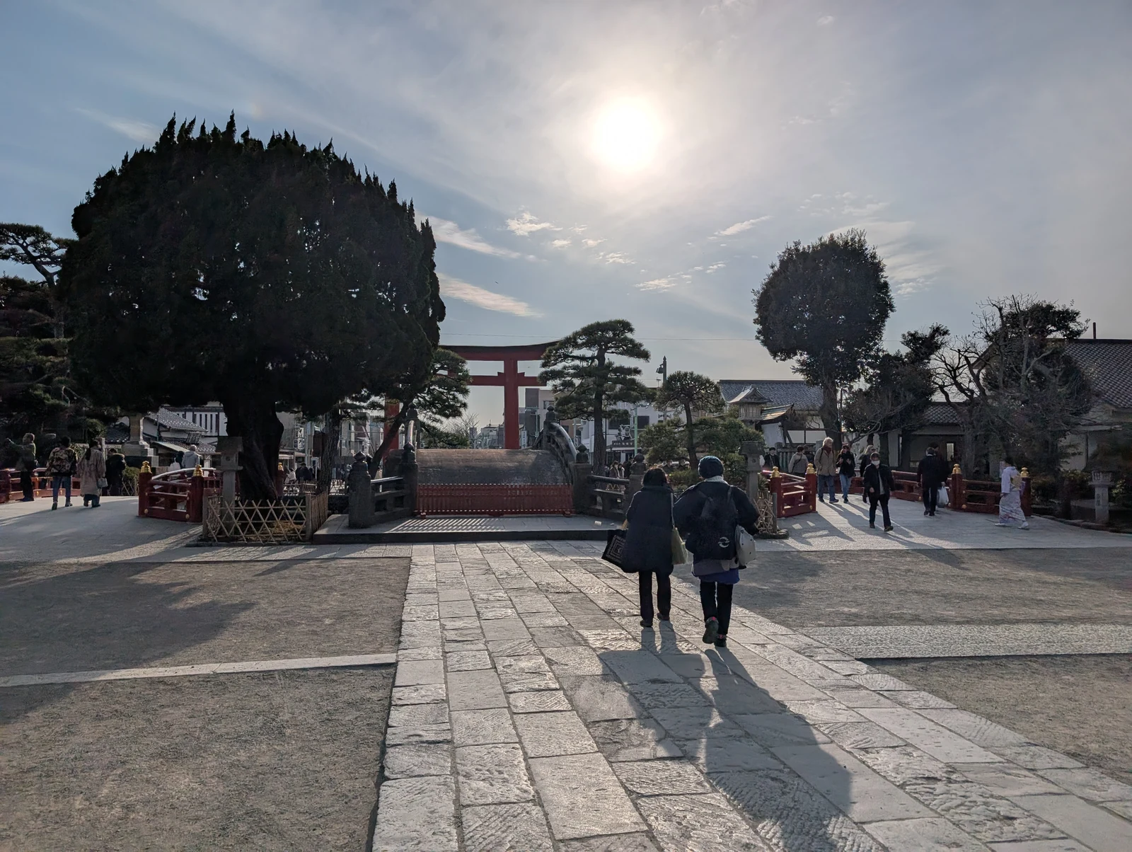 Tsurugaoka Hachimangu shrine grounds with the Maiden stage and red torii gate at Genpei pond, the central approach inside the shrine precinct