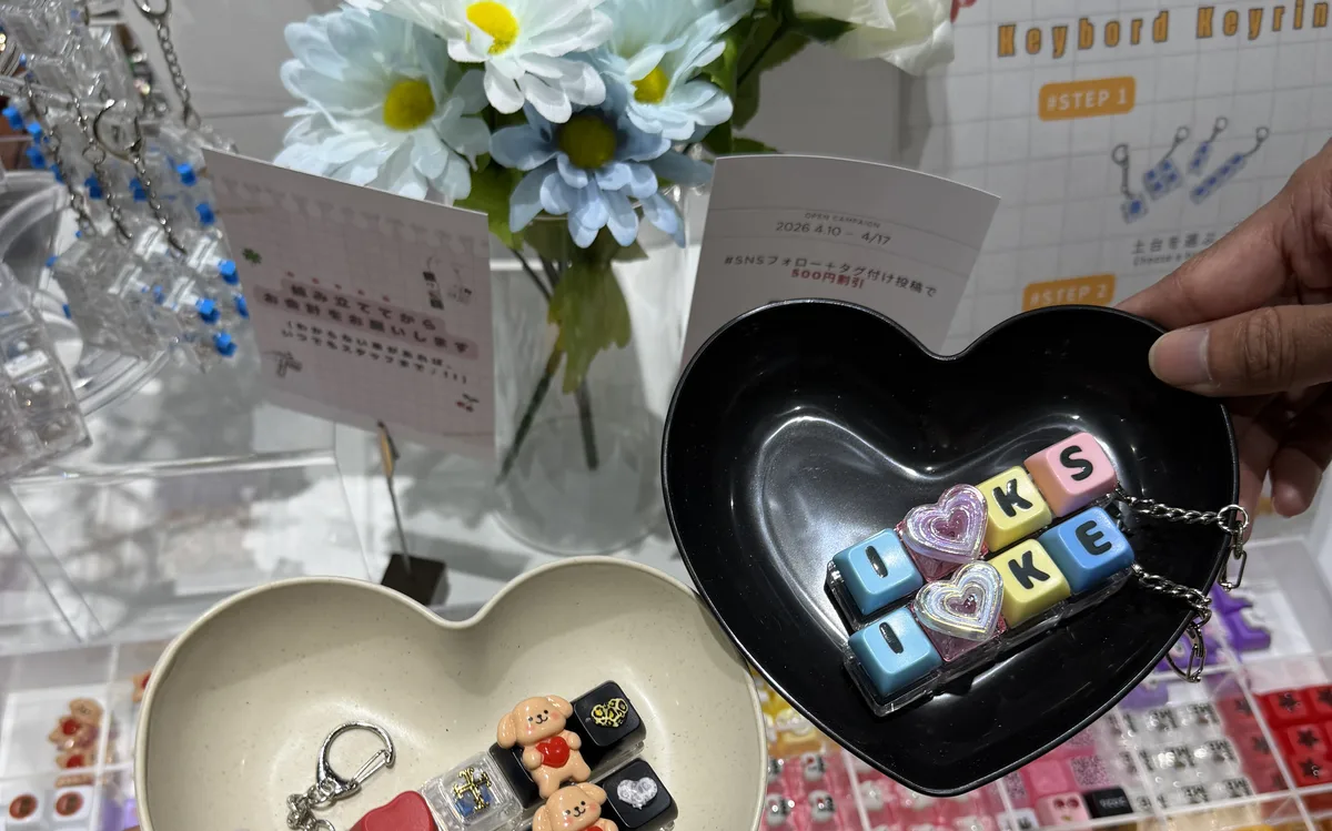 Finished custom keyboard keychains in heart-shaped trays