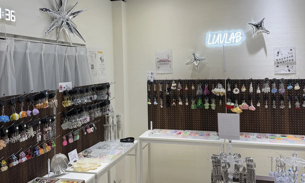 LuvLab Harajuku store interior with neon sign and crafting displays
