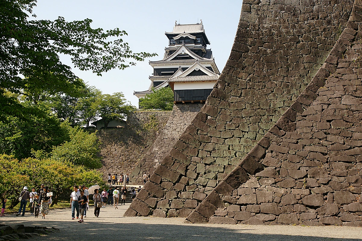 Kumamoto Castle, the iconic prefectural landmark that anchors most visitor day trips around the Straw Hat statue route