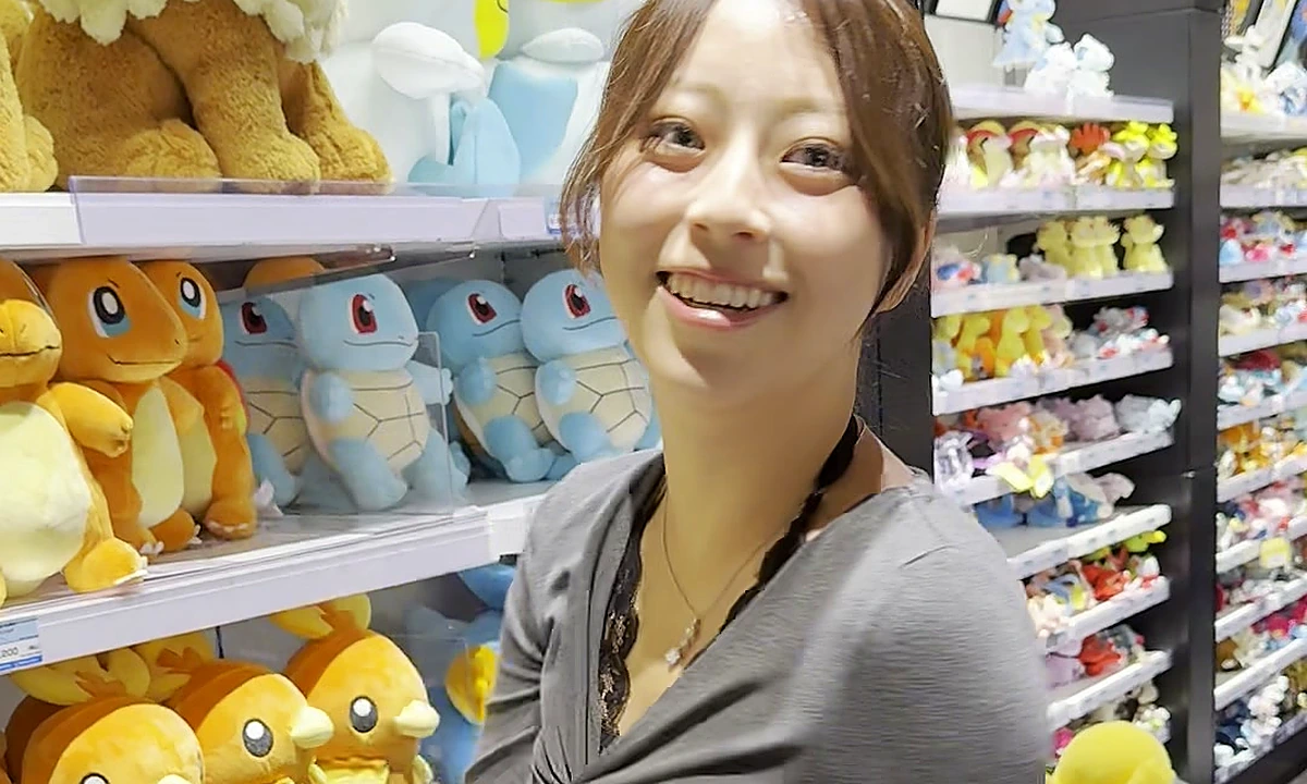 Pokemon Center Shibuya interior — plush wall with Charmander, Squirtle, Torchic inside Shibuya Parco 6F