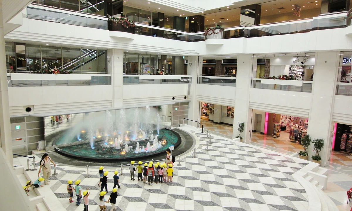 Sunshine City atrium fountain interior in Ikebukuro — the Toshima-ku complex hosting Exhibition Hall A on the 4F World Import Mart Building, the Ranma 1/2 2026 exhibition venue
