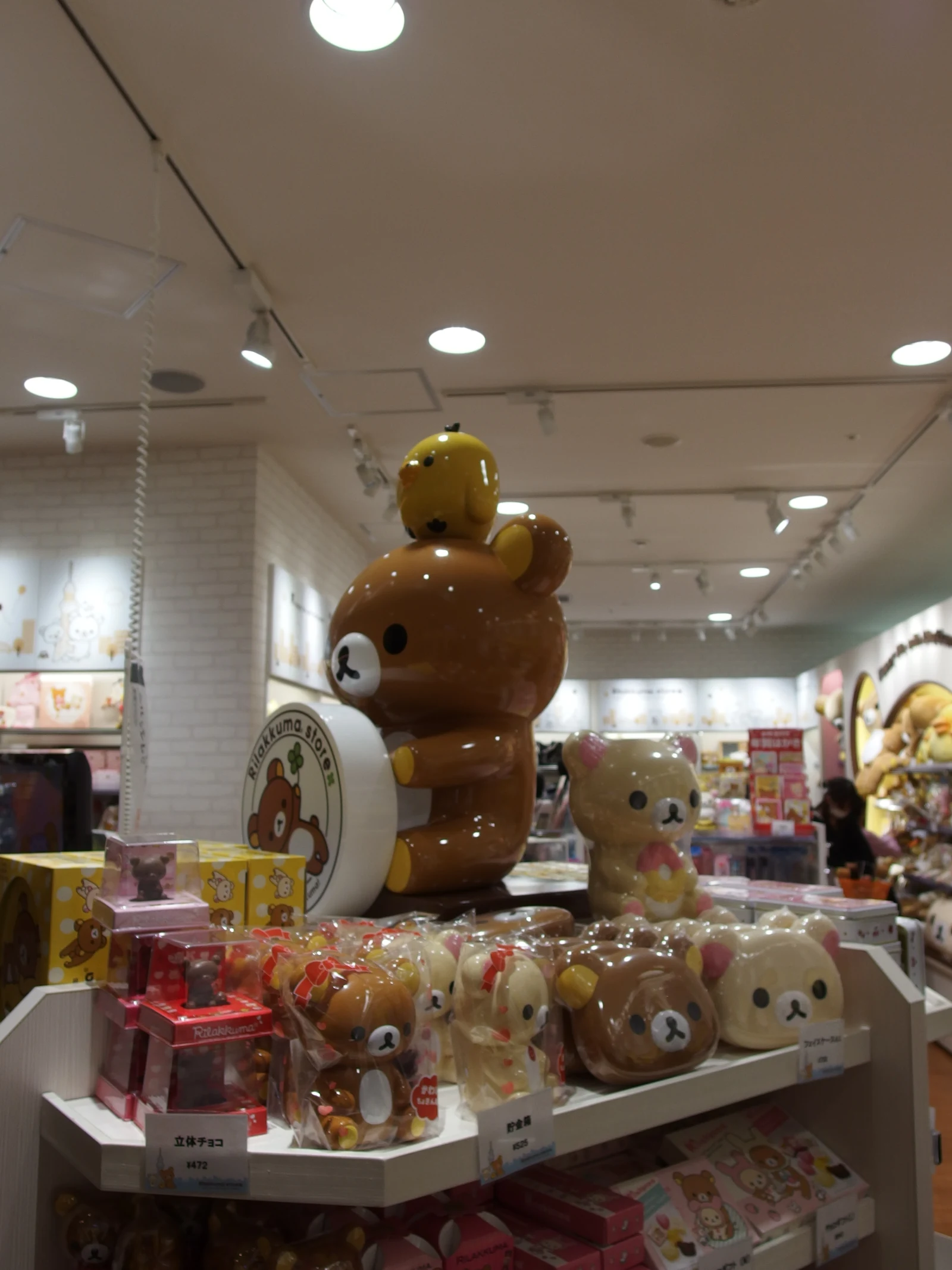 Rilakkuma branded retail store interior at Tokyo Solamachi with Korilakkuma and Kiiroitori plush displays, illustrative San-X store context, not 2026 cafe decor