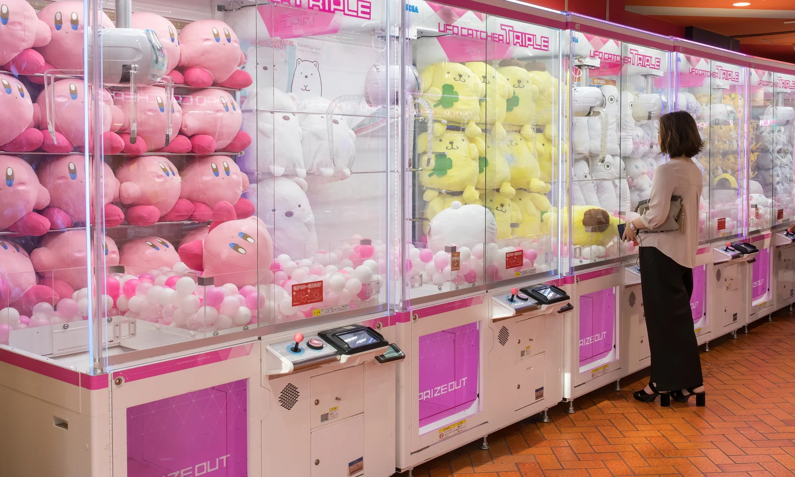 Akihabara Electric Town claw-crane arcade with kawaii plushies — Tokyo is home to multiple anime districts each with its own specialty and culture