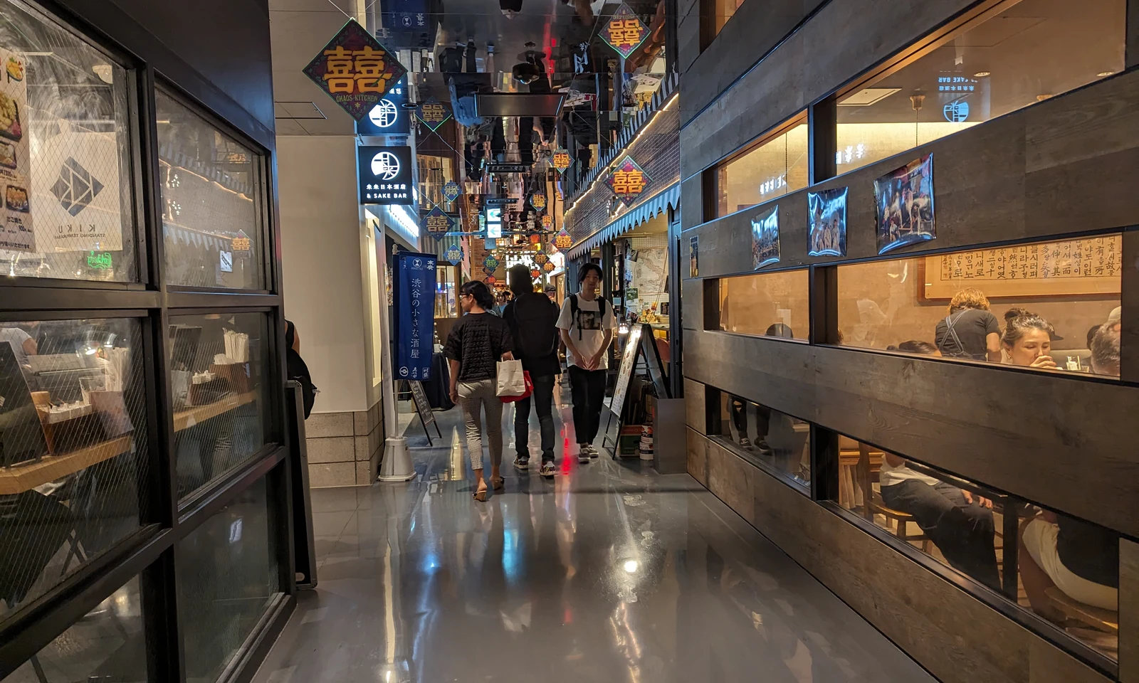 Shibuya night-life street near Shibuya PARCO, the building's 6th floor concentrates Nintendo TOKYO, Pokemon Center Shibuya, Jump Shop, Capcom Store and Godzilla Store in one place